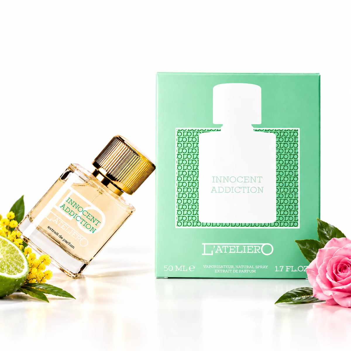 L’ATELIERO Innocent Addiction Extrait de Parfum 50 ml: schräg gestellter Flakon neben mintgrüner Box auf weißem Grund.